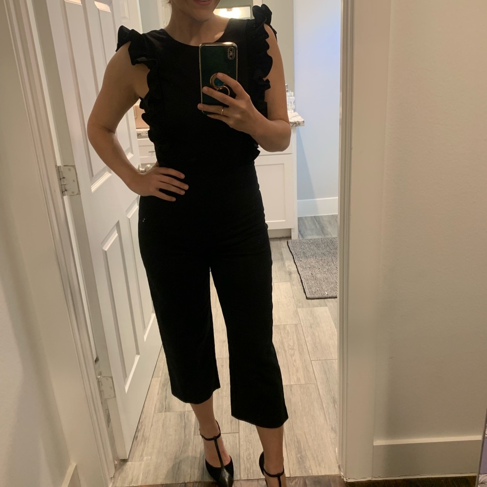 Gianni Bini black jumpsuit with ruffle shoulders, Size 4